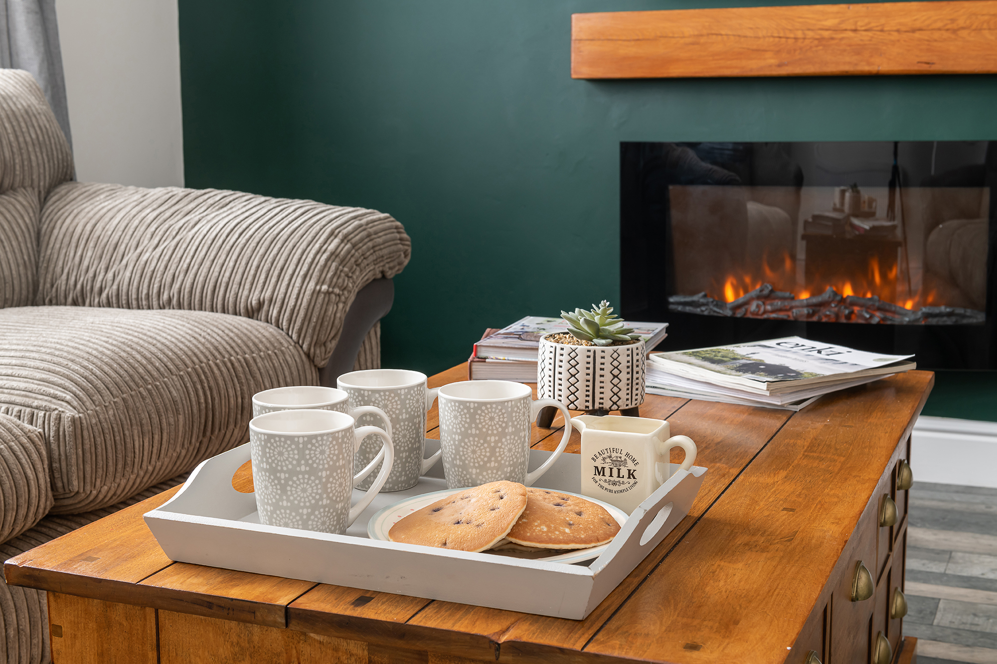 Breakfast tray beside the fire in the cosy lounge